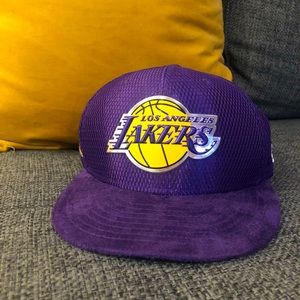 Los Angeles Lakers New Era Cap w/ suede brim and under brim logo design.